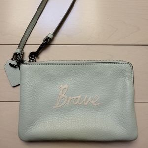 Coach leather light green wristlet with zipper top